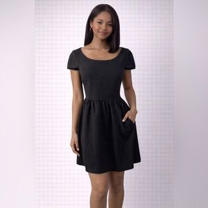 Delia’s Little Black Dress, Size Medium, NWT. Lightweight. Open back.